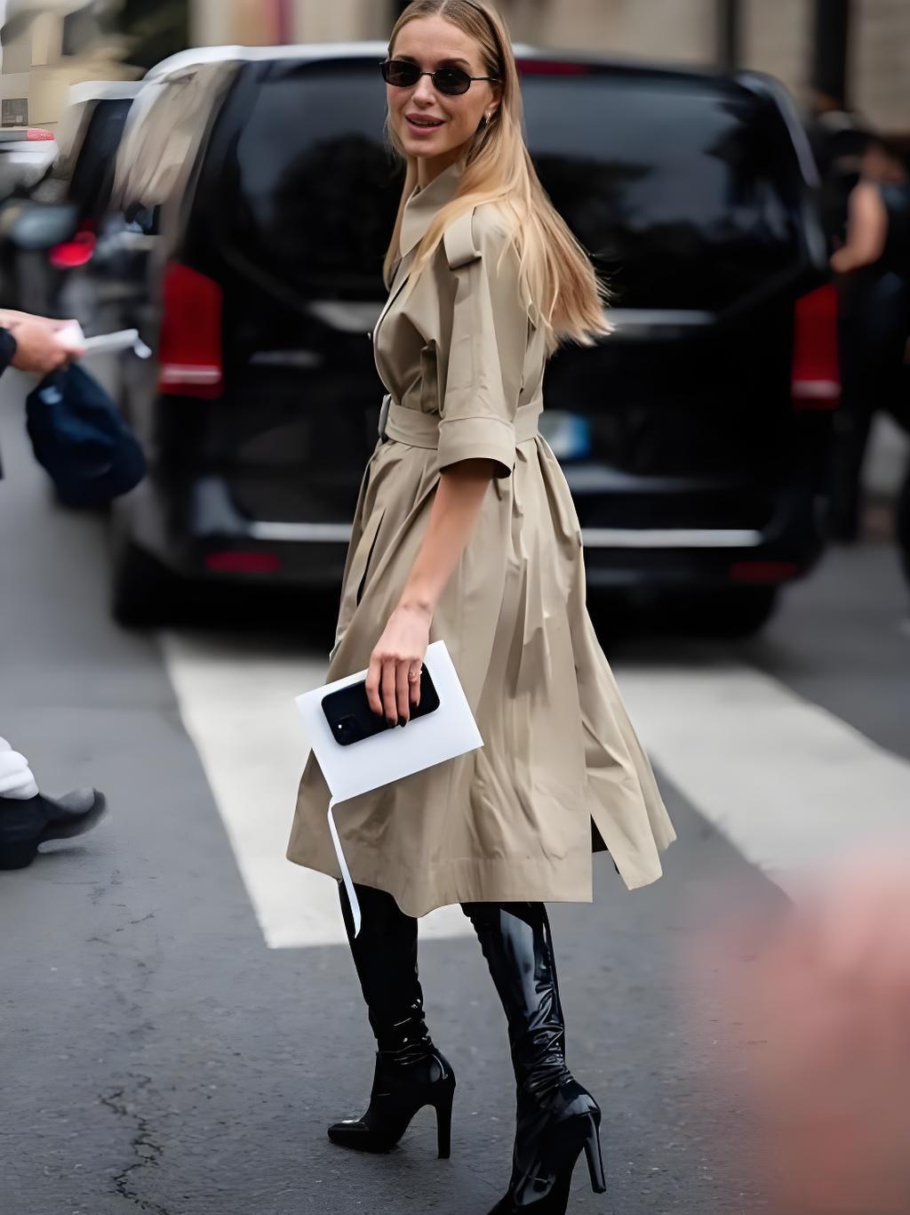 khaki trench coat with black knee high boots