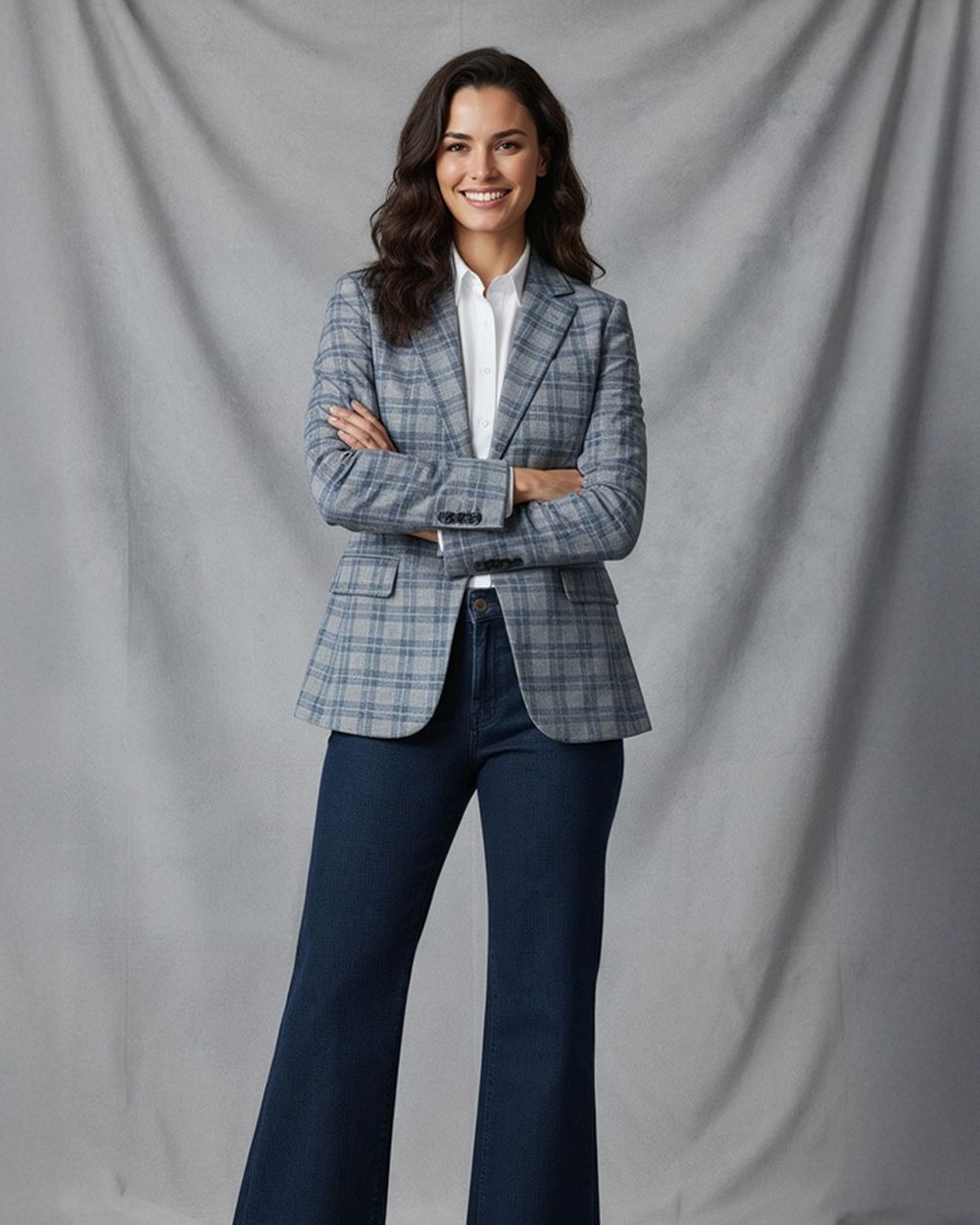 Grey plaid blazer with white shirt and flared jeans