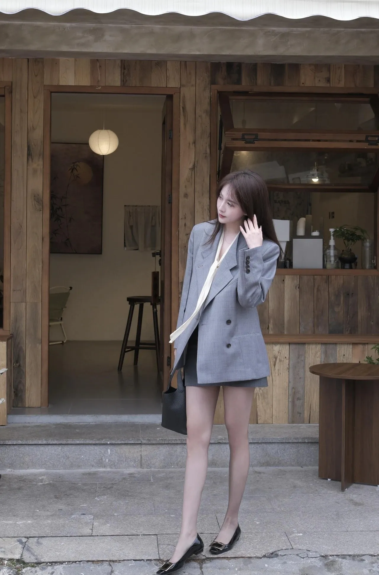 Chic Oversized Blazer and Shorts with Black Flats for a Sophisticated Look