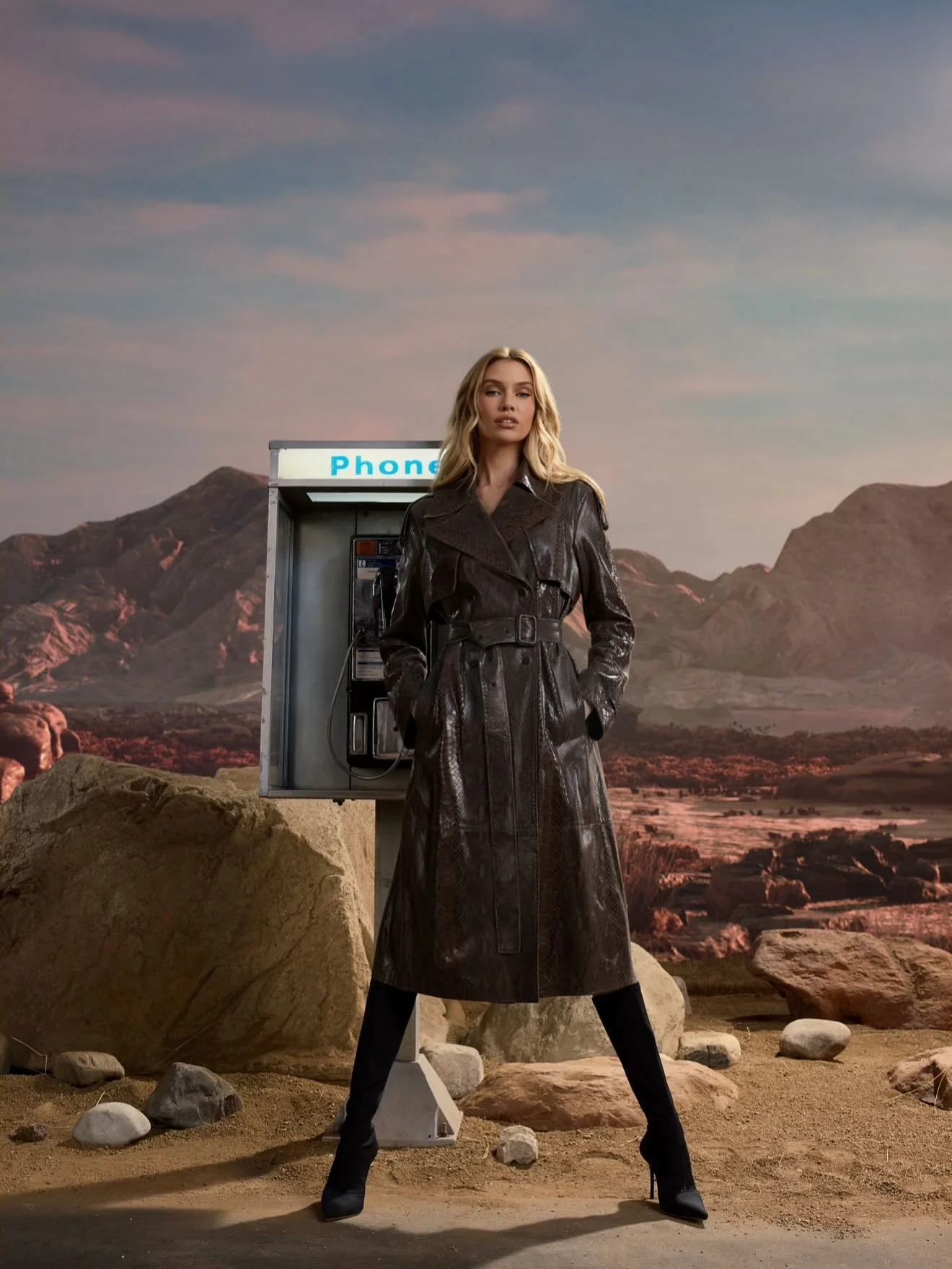 Stella Maxwell in Chic Long Leather Coat with Black Heeled Boots in Earth Tones