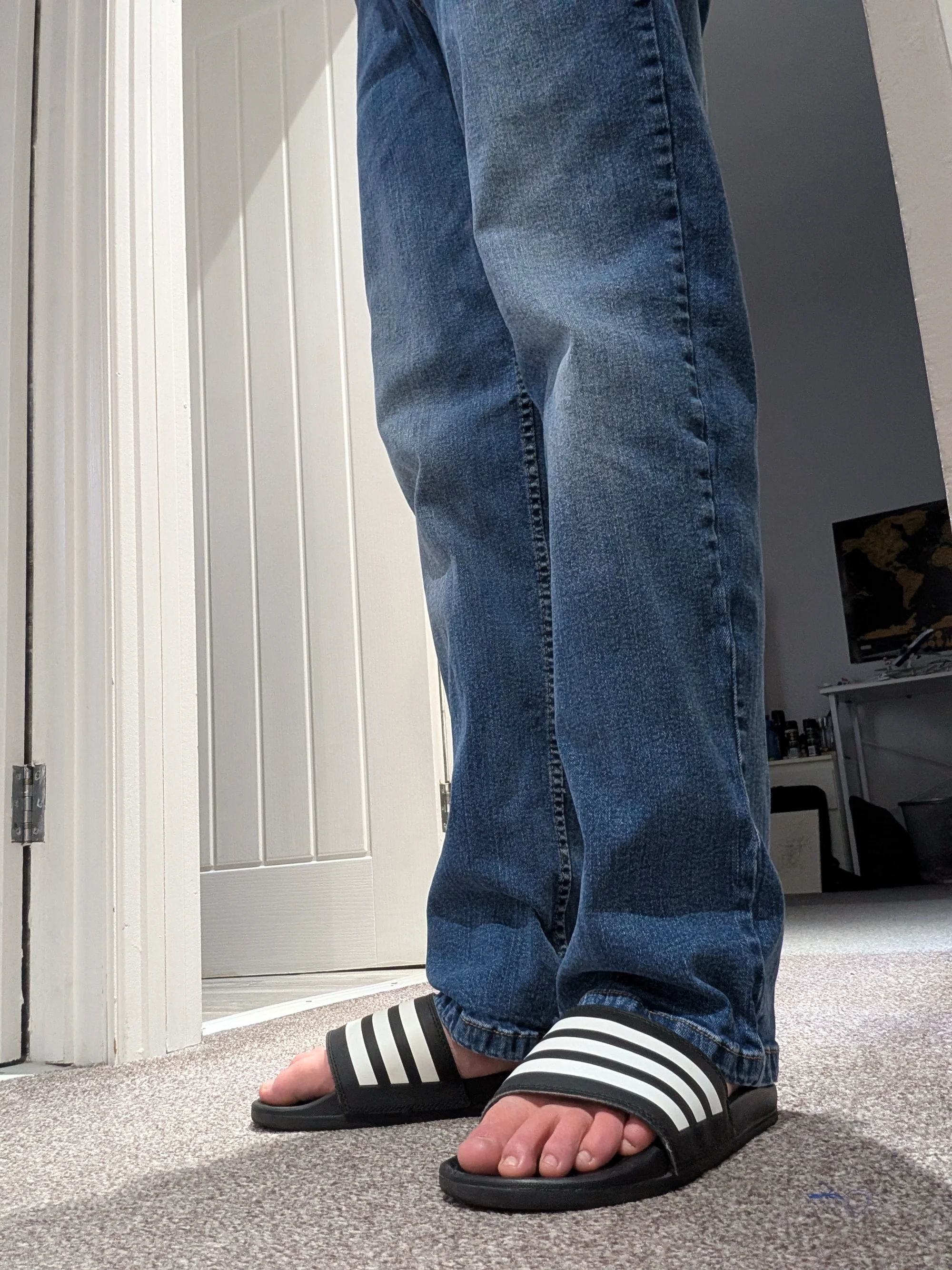 Casual Comfort with Baggy Blue Jeans and Classic Slides