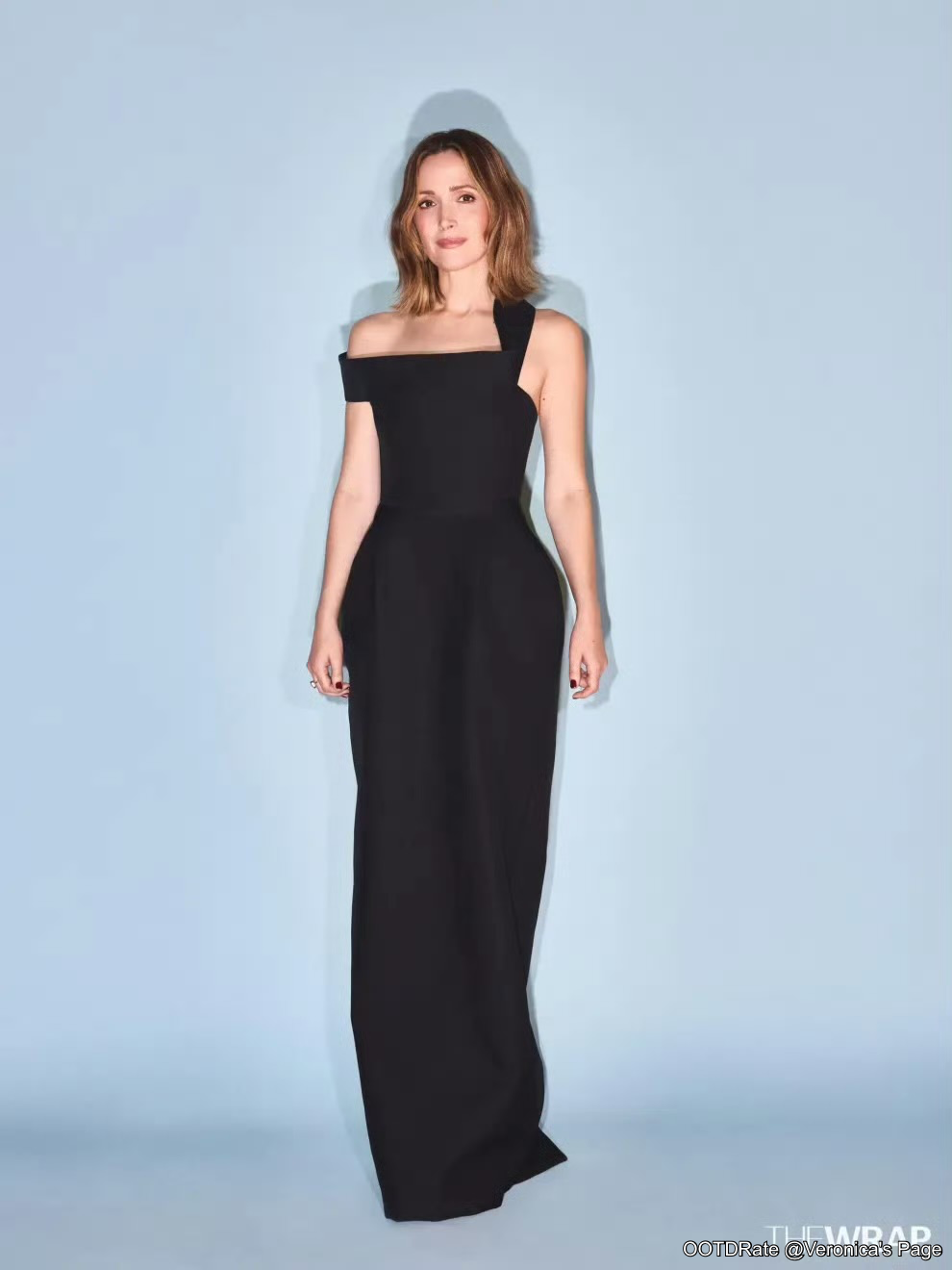 Elegant Black Strap Gown with Asymmetric Detailing for a Chic Look