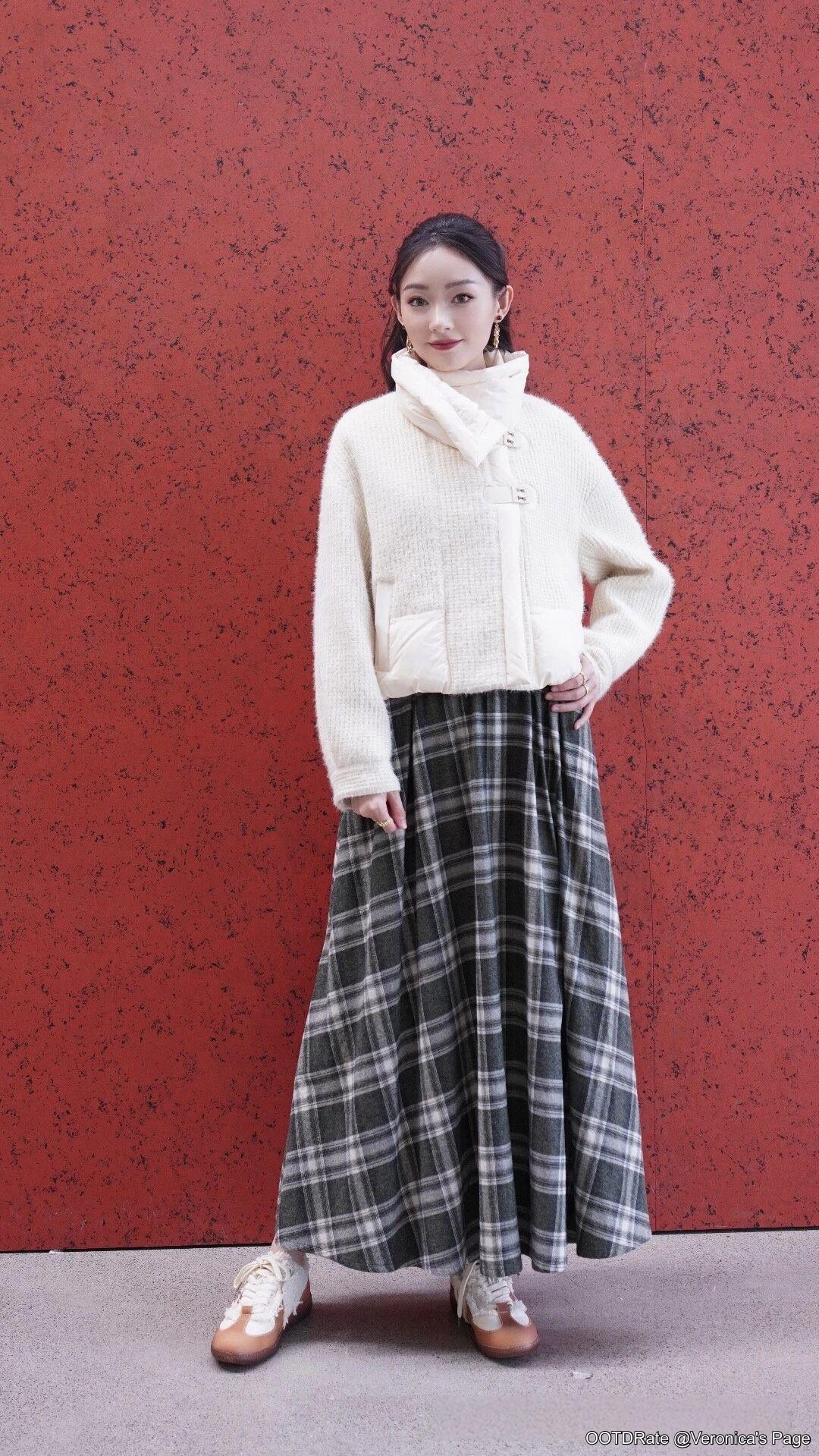 Cozy Cream Sweater with Bold Plaid Maxi Skirt for Casual Elegance