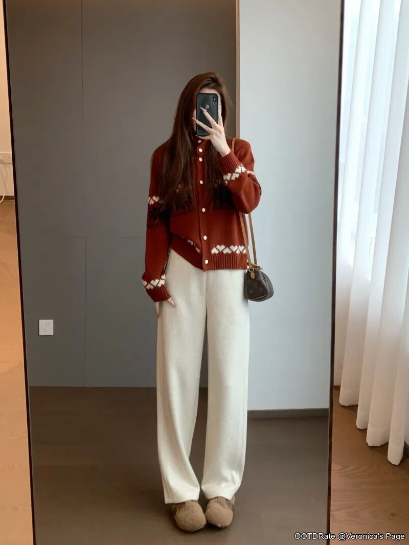 Cozy Chic Style: Rust Sweater and Cream Trousers Ensemble