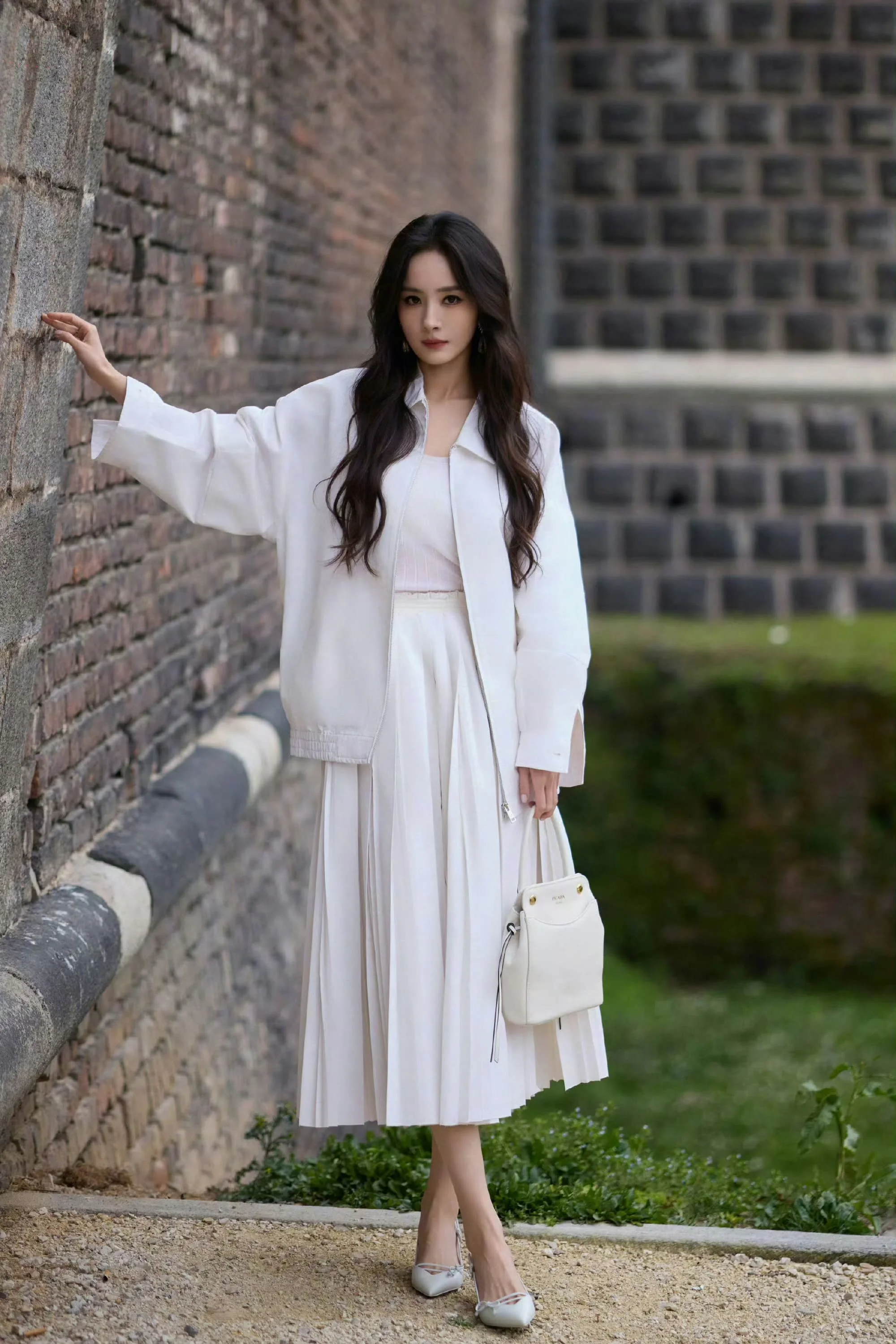 Elegant Monochrome White Ensemble with Soft Tailoring and Midi Skirt