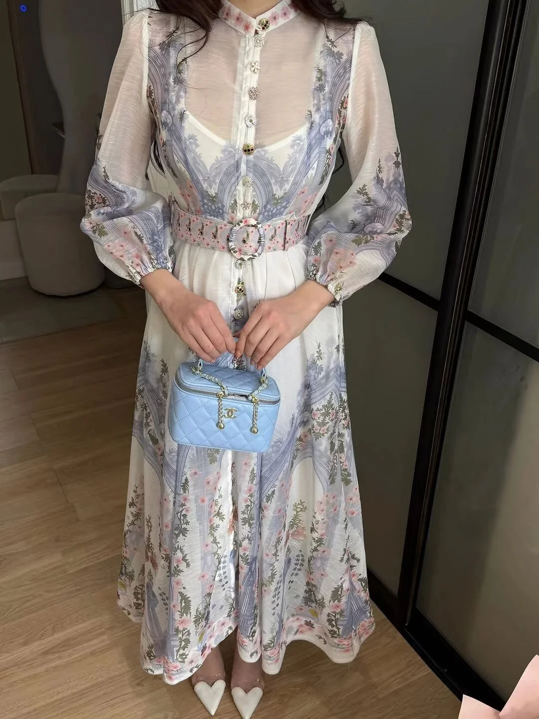 Romantic Pastel Dress with Delicate Prints and Quilted Blue Handbag