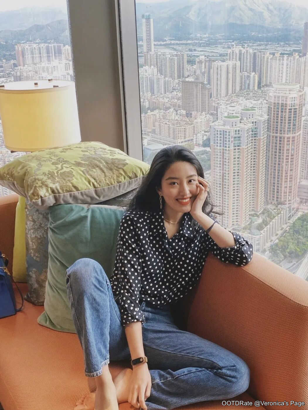 Classic Navy Polka Dot Blouse with Blue Jeans for a Chic Casual Look