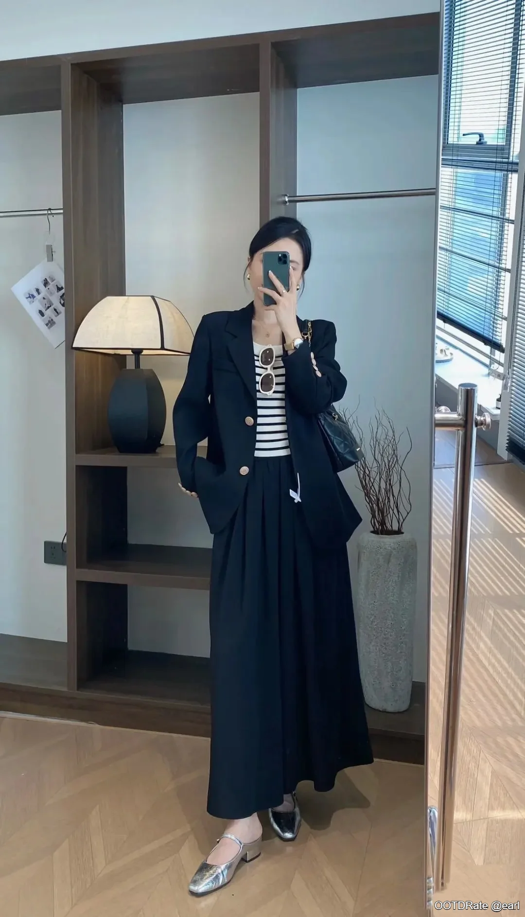 Chic Nautical-Inspired Outfit with Black Blazer and Striped Top