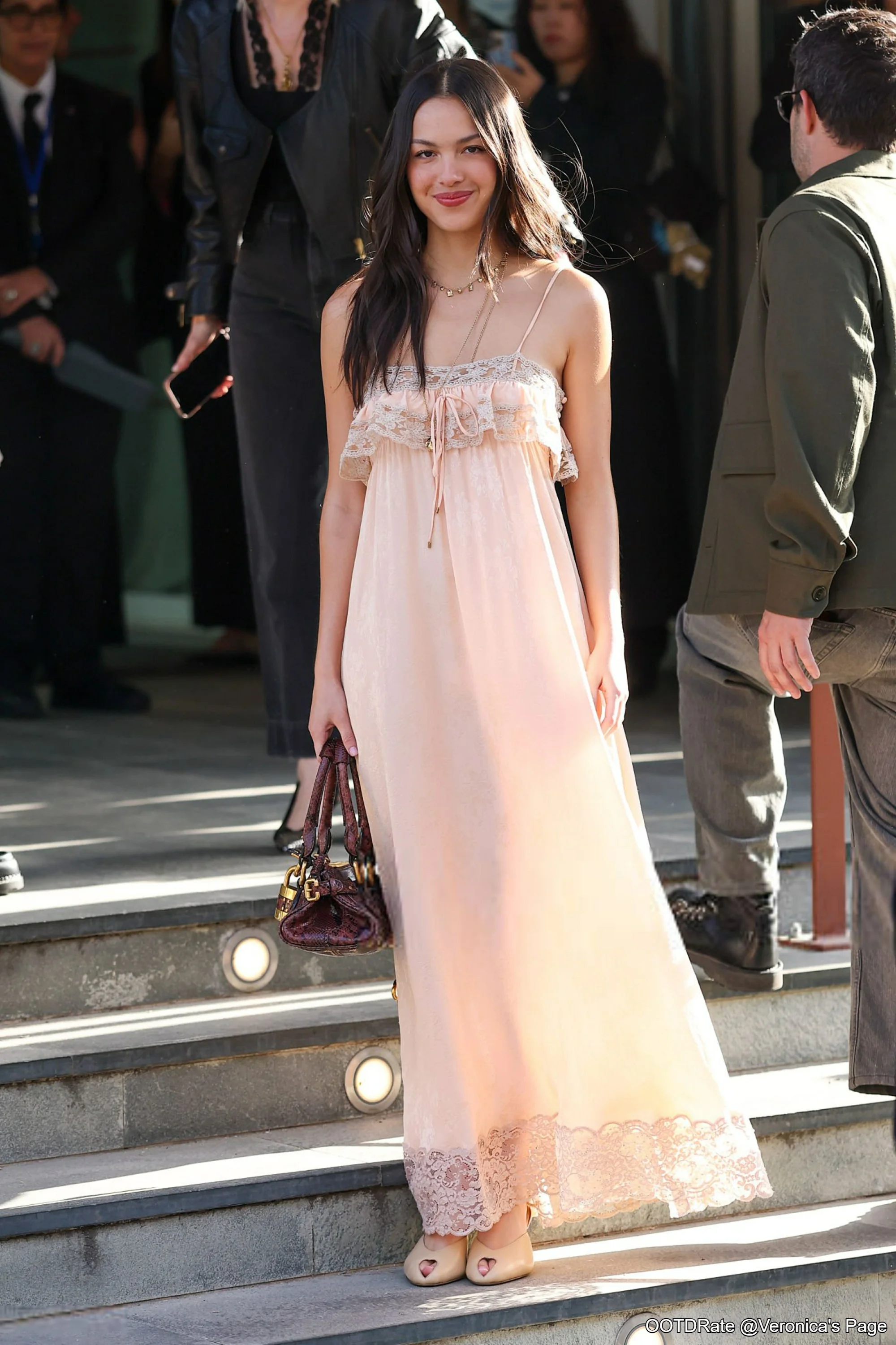 Elegant Blush Pink Lace Dress with Vintage Handbag and Neutral Shoes