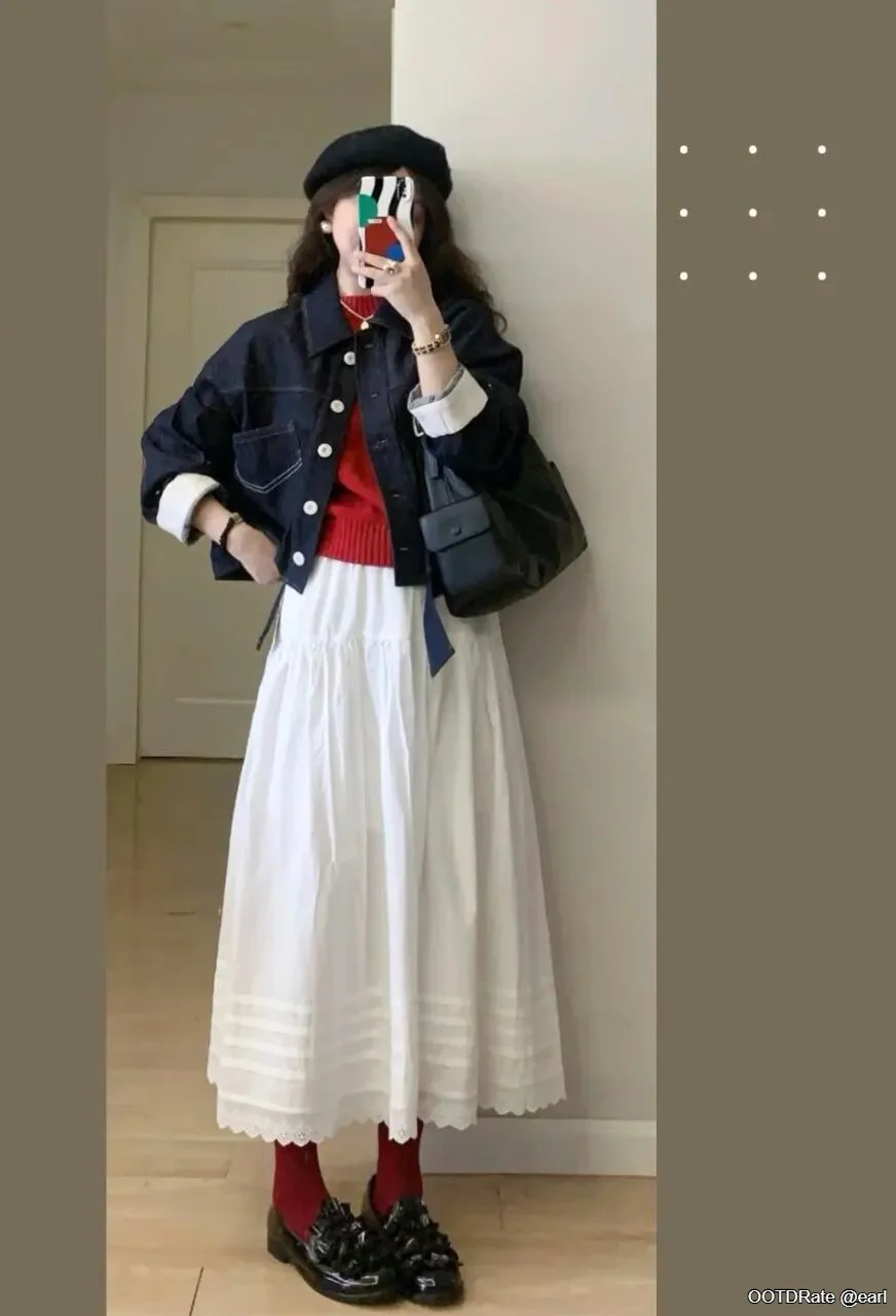 Parisian-Inspired Chic: Red Sweater, White Midi Skirt, and Navy Jacket Ensemble