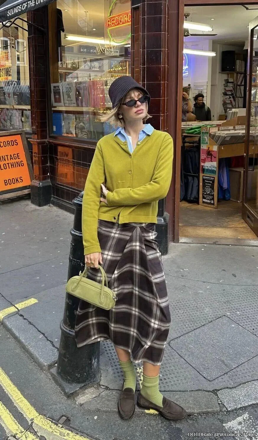 Vintage Street Style: Mustard Cardigan and Plaid Skirt with Eclectic Accessories