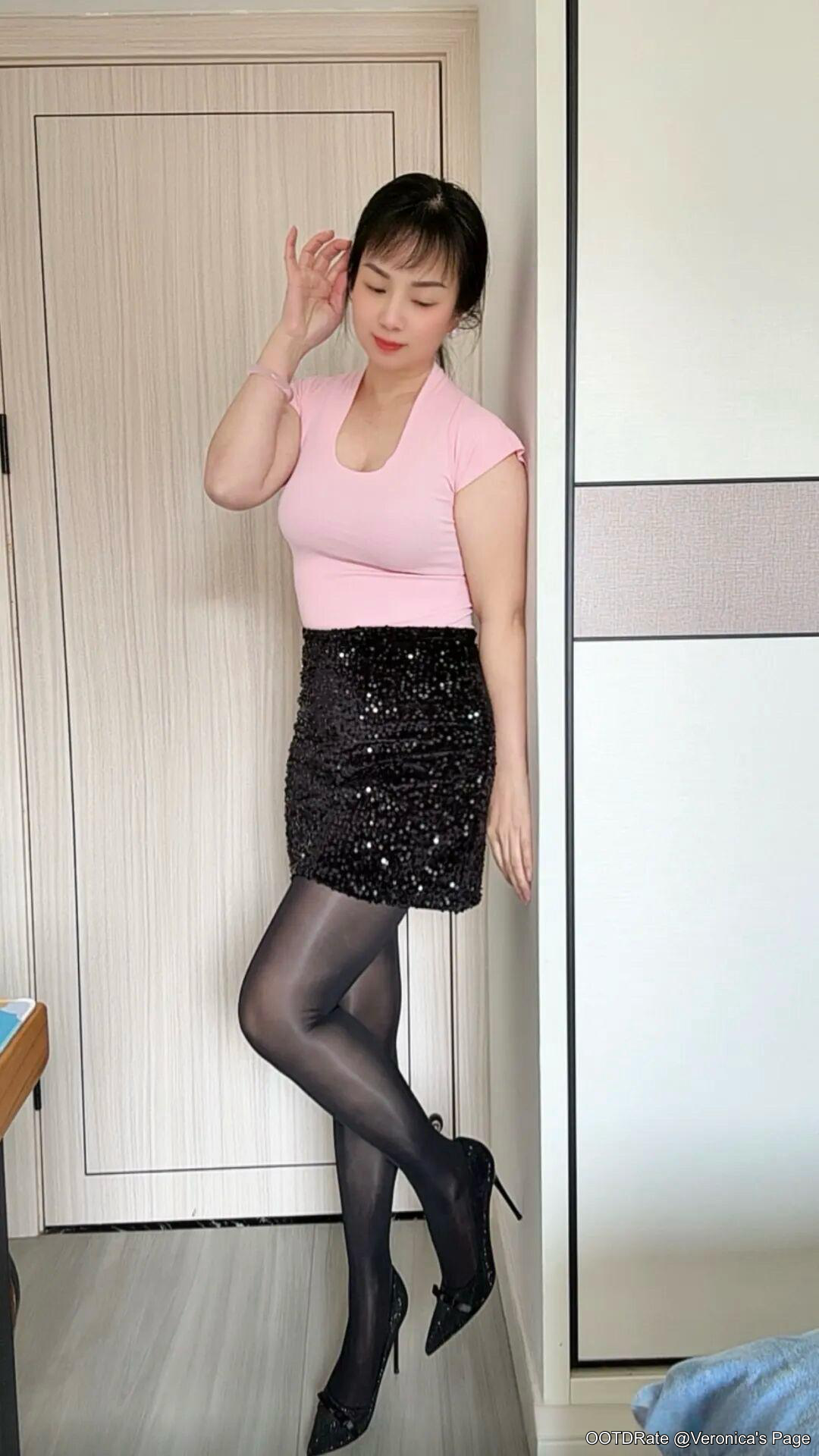 Glamorous Contrast: Pink Top and Black Sequined Skirt with Elegant Accessories