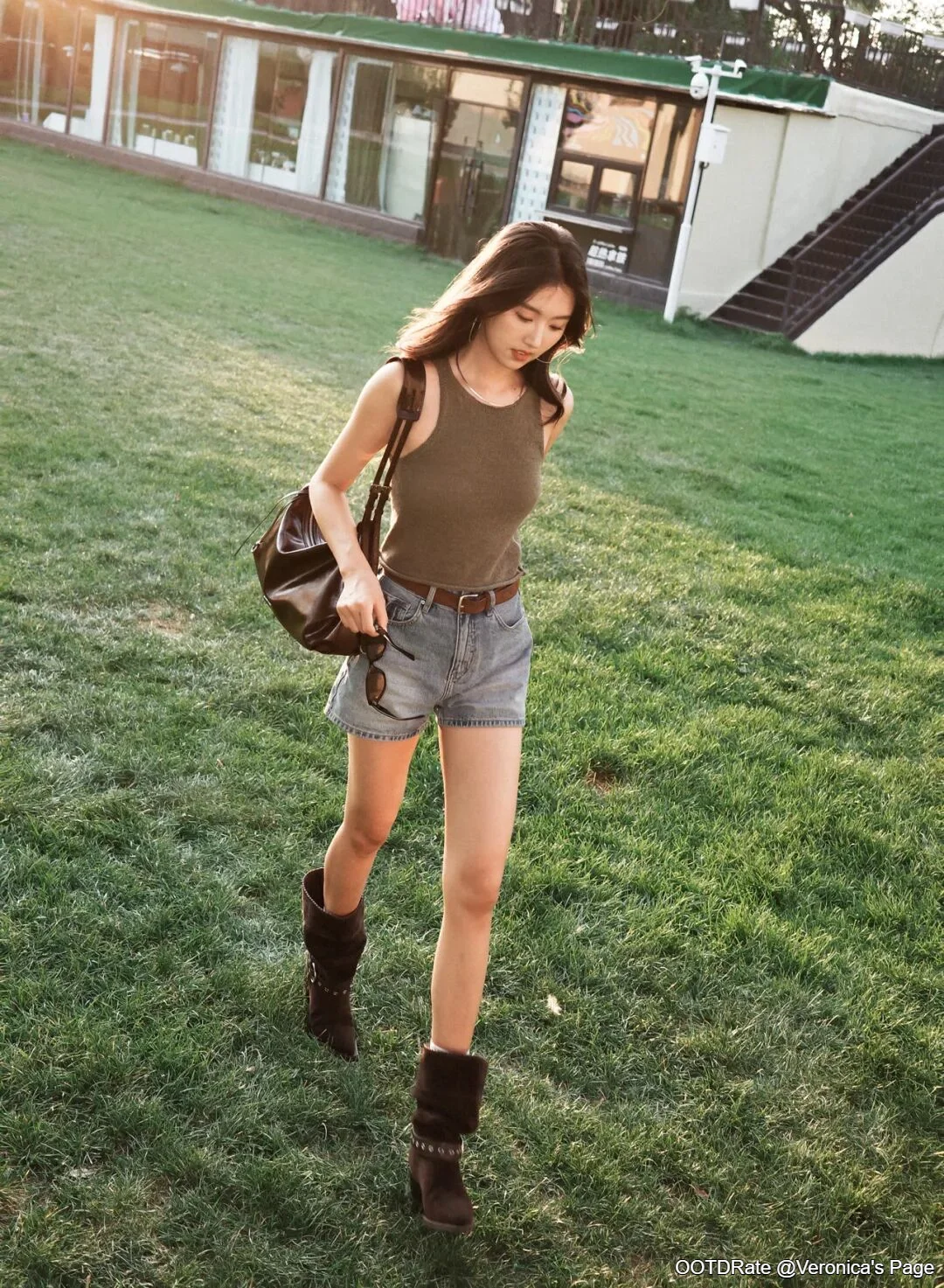 Casual Outdoor Style with Olive Tank, Denim Shorts, and Brown Boots