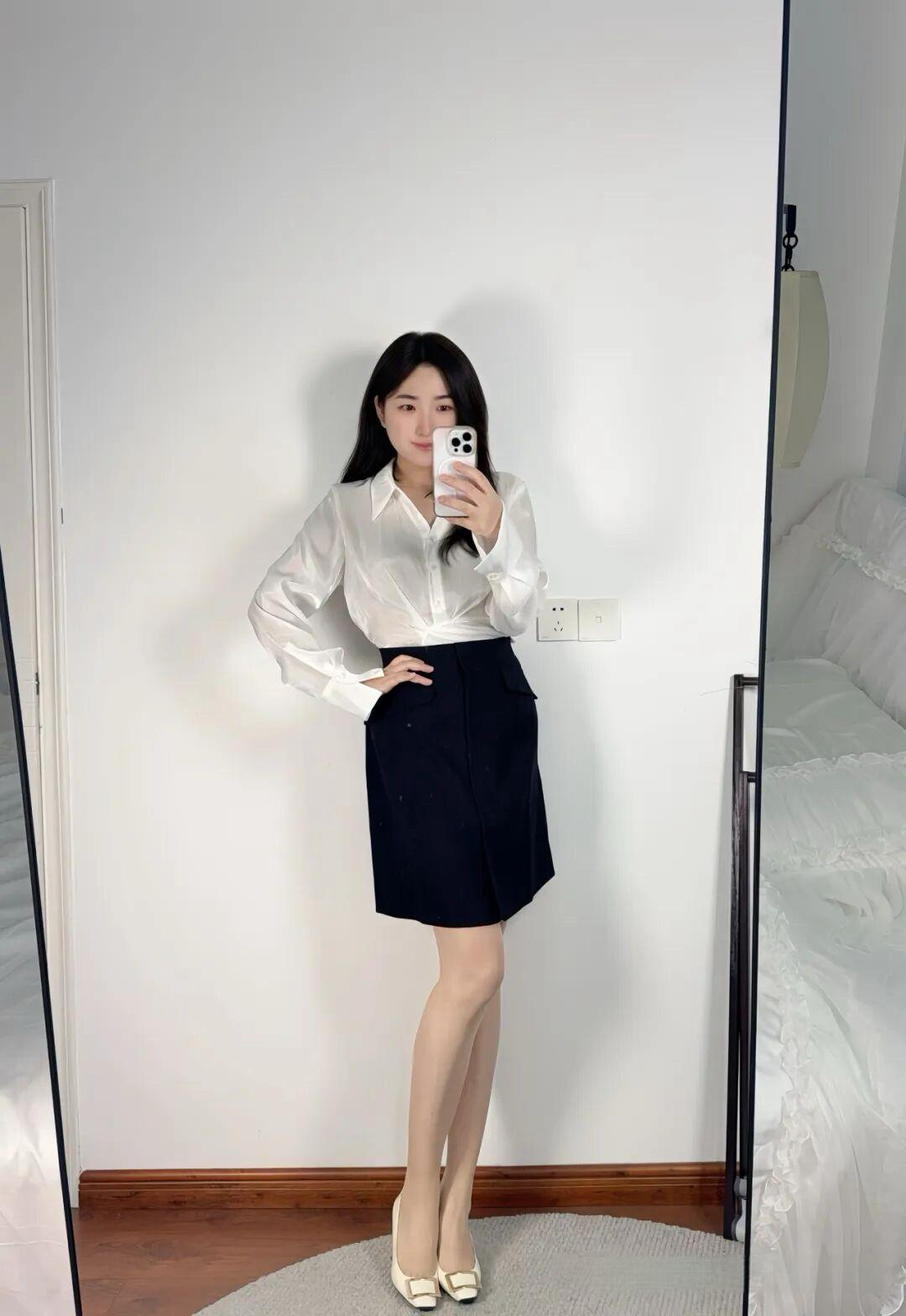 Elegant Business-Casual Outfit with White Shirt and Navy A-Line Skirt