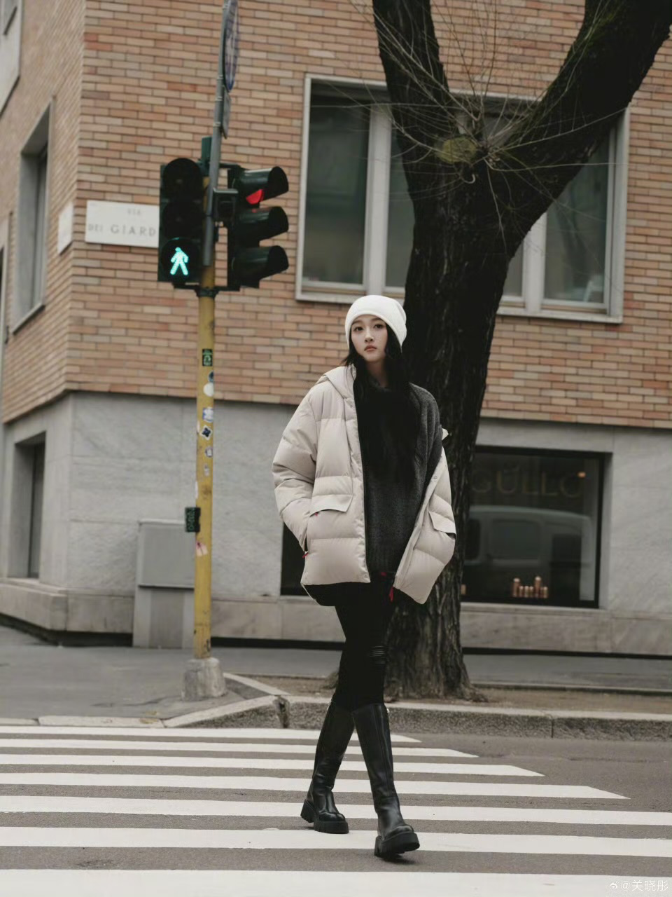 Chic and Cozy Winter Style with Puffy Jacket and Knee-high Boots