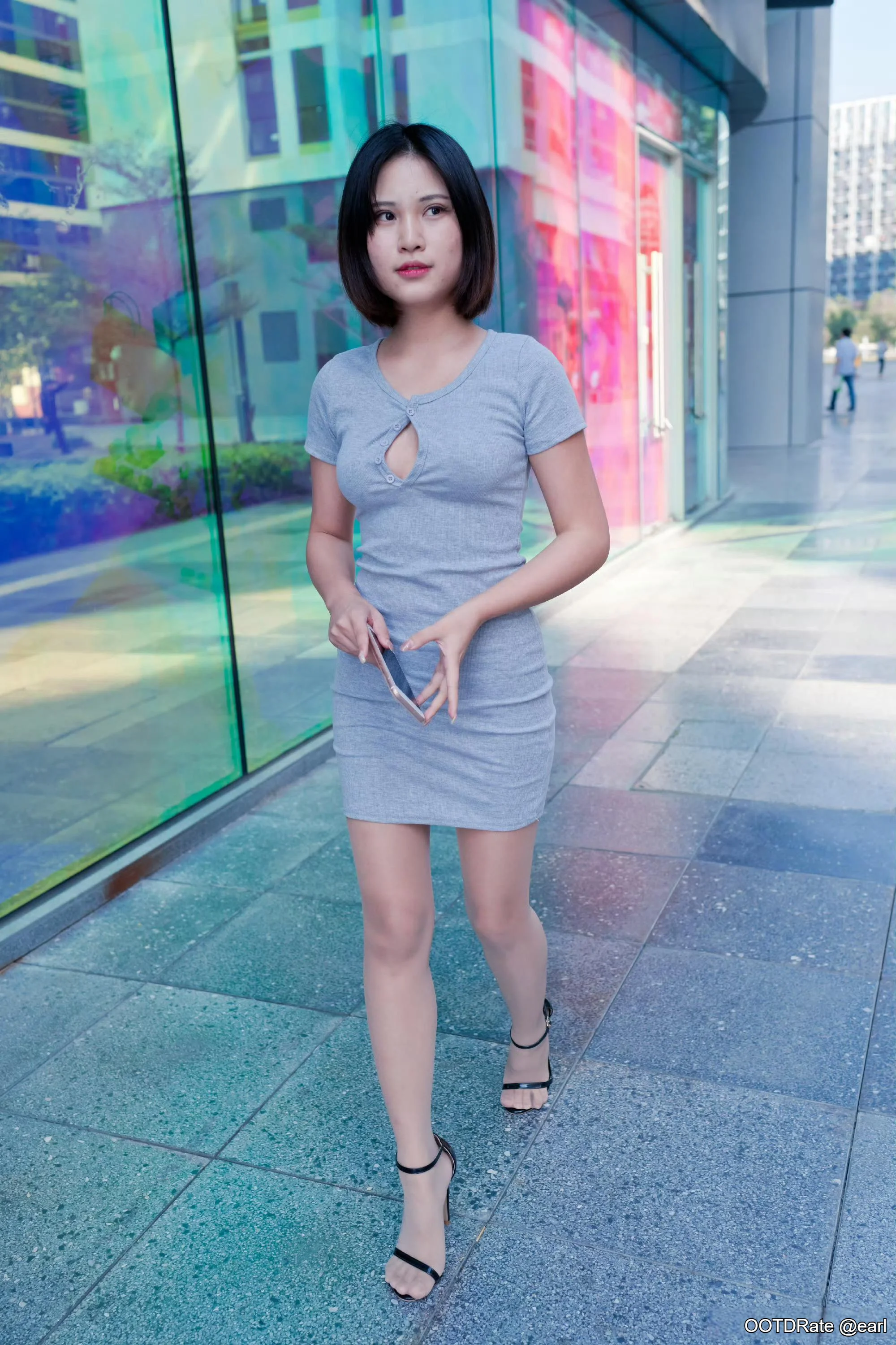 Stylish Grey Fitted Dress with Keyhole Detail and Black Strappy Sandals for Urban Vibes