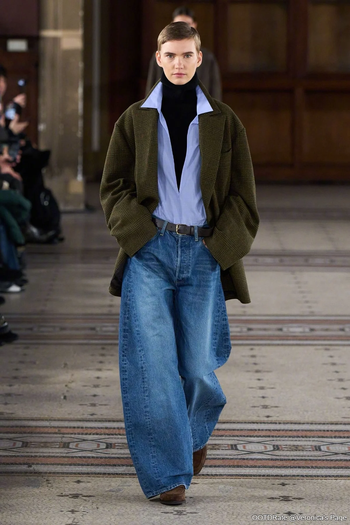 Oversized Green Coat with Wide-Leg Jeans and Layered Casual Elegance