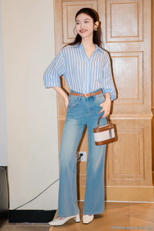 Classic Striped Shirt with High-Waisted Bootcut Jeans and Chic Accessories