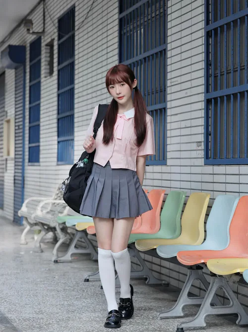 Classic Schoolgirl Outfit with Pink Top and Gray Pleated Skirt