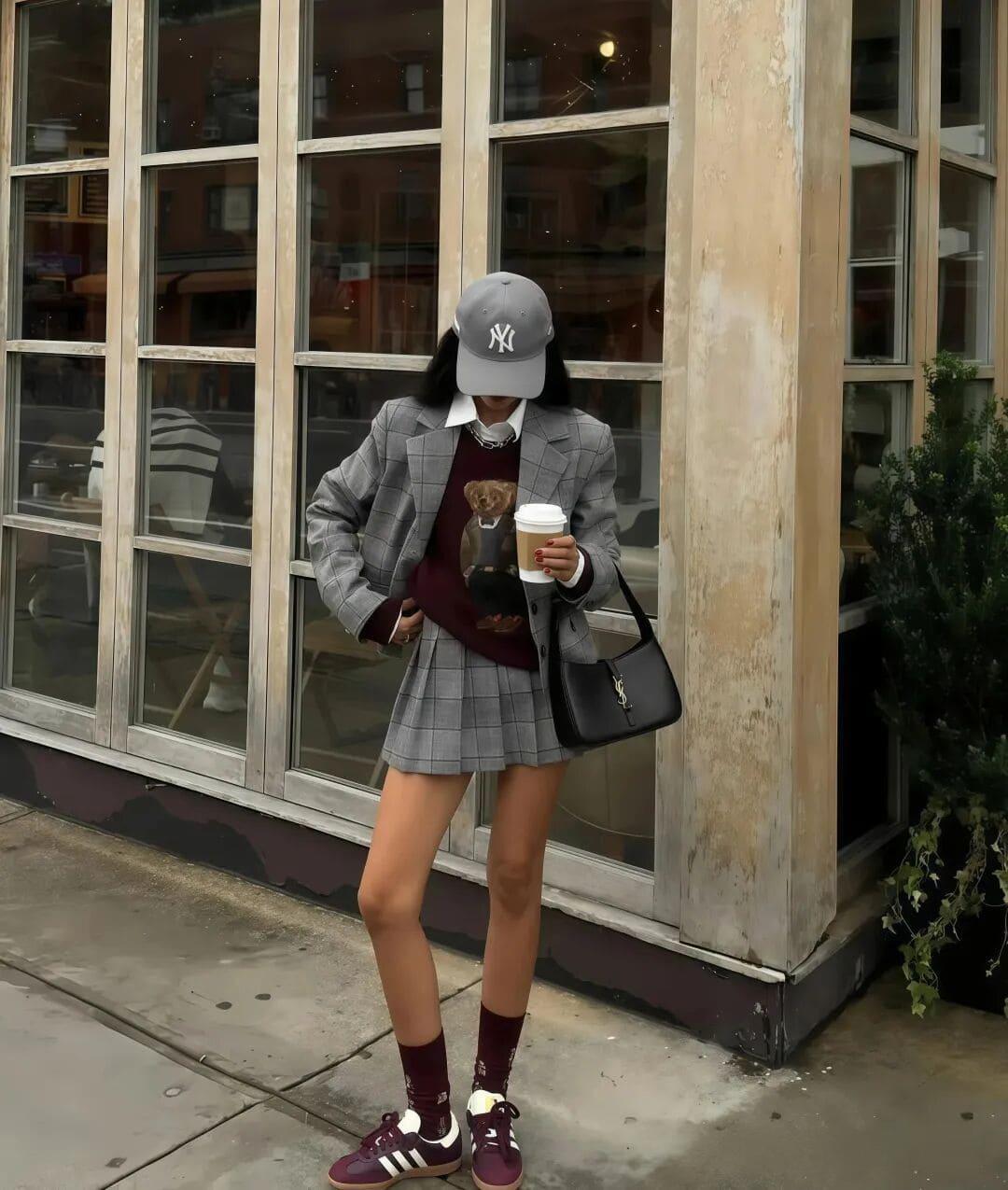 Early spring pleated skirt and sweatshirt outfit